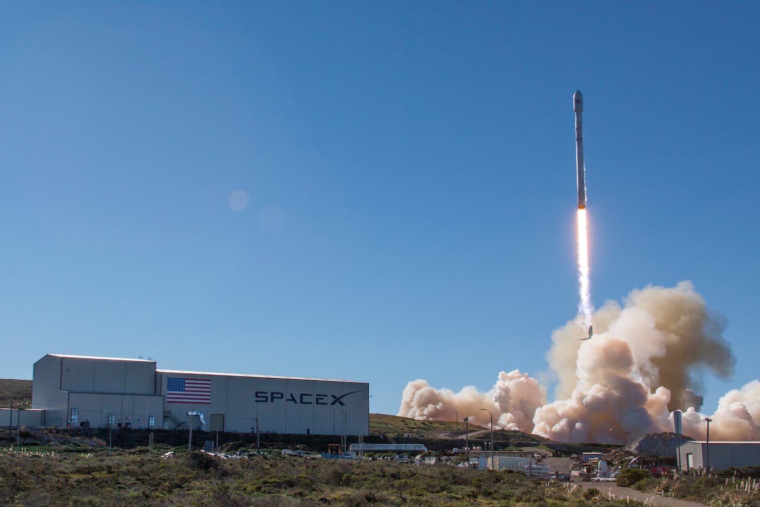 Background SpaceX Falcon 9 Iridium-1 launch.